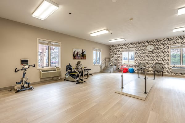 Interior of a therapy room with exercise equipment