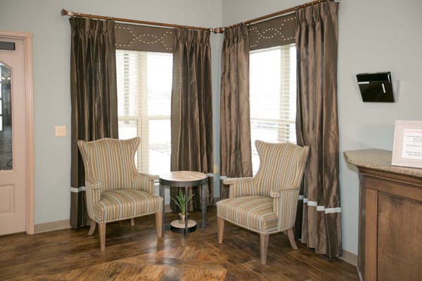 Cozy seating area with armchairs and a table