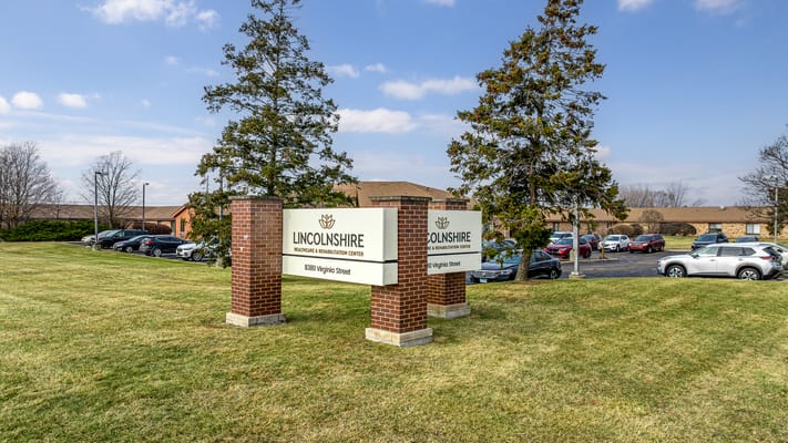 Signage for Lincolnshire Health Care Center exterior with parking lot