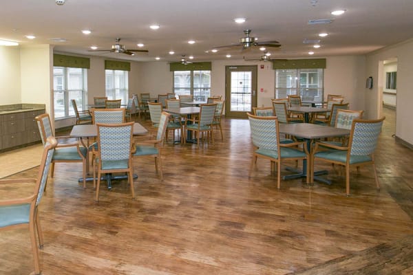 Interior view of the dining room with tables and chairs