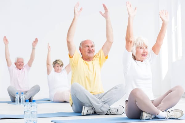 Residents participating in a group exercise class