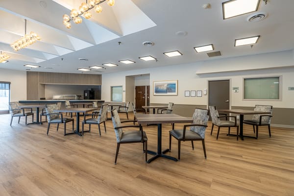 Bright dining room with tables and chairs