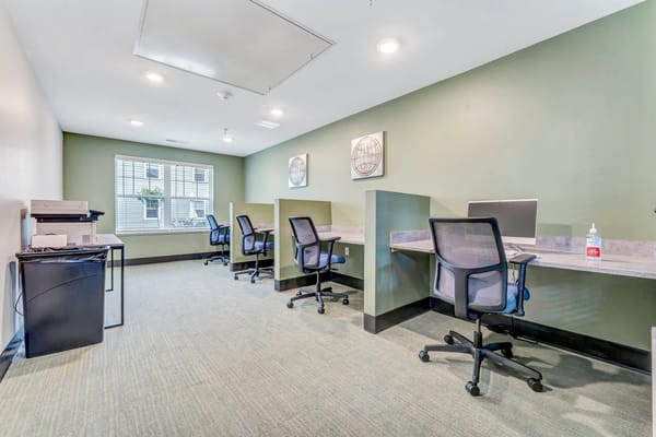 Quiet interior workspace with desks and computers