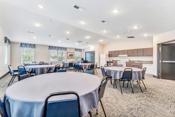 Interior view of a common area with tables and chairs