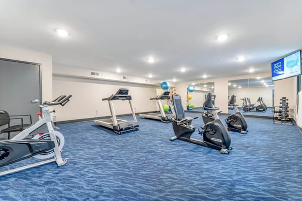 Interior view of a fitness room with exercise equipment