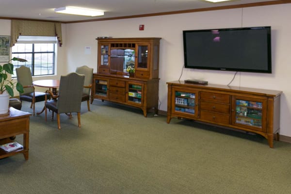Common area with seating and television