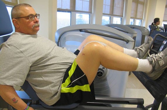 Resident exercising in a fitness area