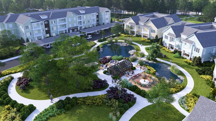 Aerial view of outdoor spaces and buildings at Porters Neck Village