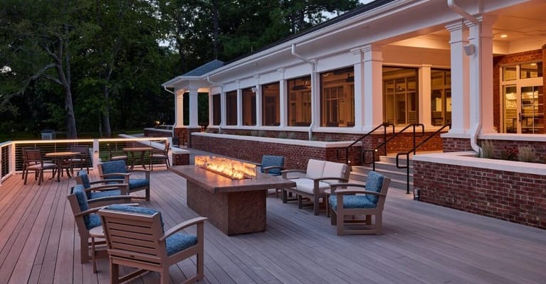 Outdoor patio area with seating and fire pit
