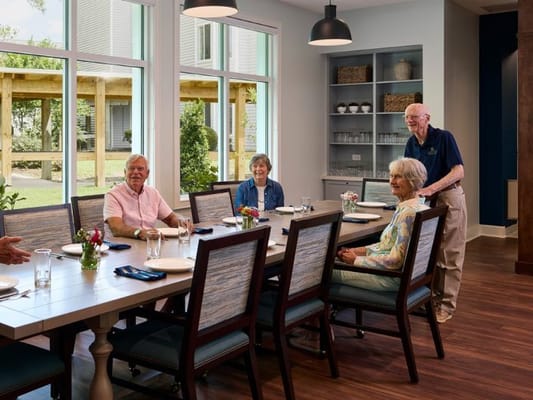Residents enjoying a meal in the dining room