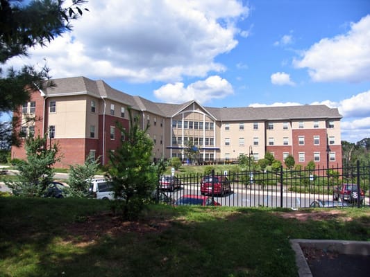 Exterior view of Roosevelt Care Centers with landscaping