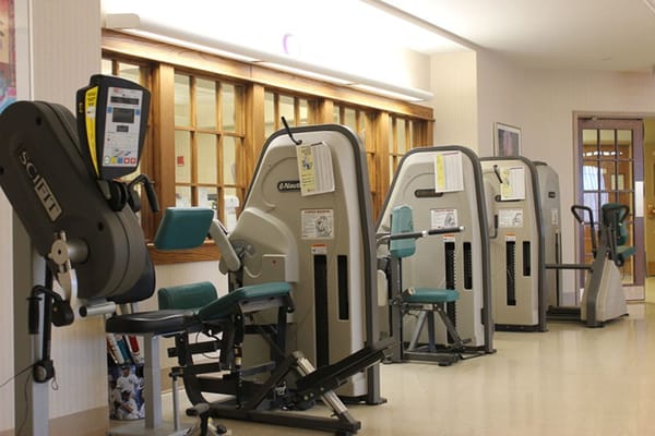 Fitness equipment in a well-lit interior space
