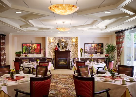 Elegant dining area with tables set for meals