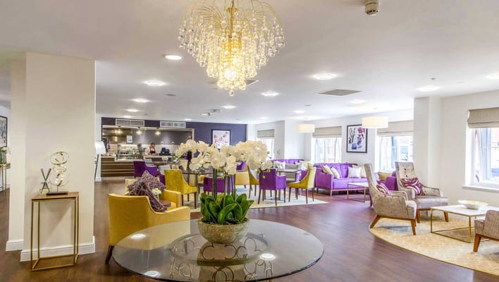 Bright and modern common area with seating and décor