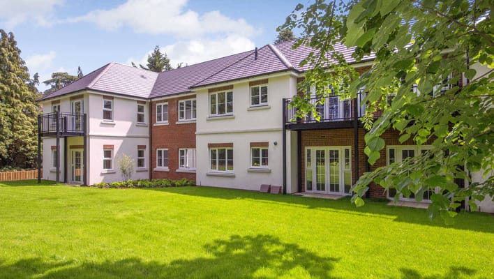 Exterior view of Eaves Court with well-maintained garden