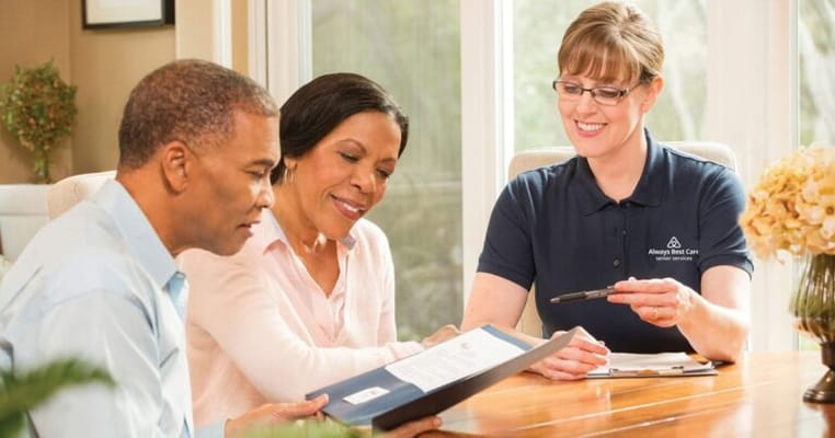 Residents discussing care options with a staff member