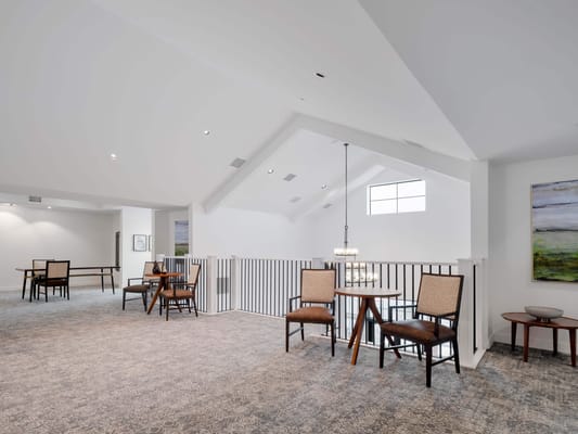 Bright common area with seating and artwork