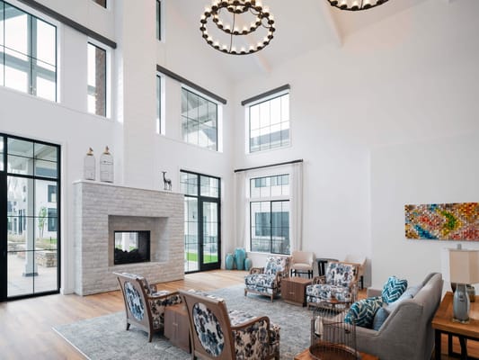 Interior view of a bright common area with seating