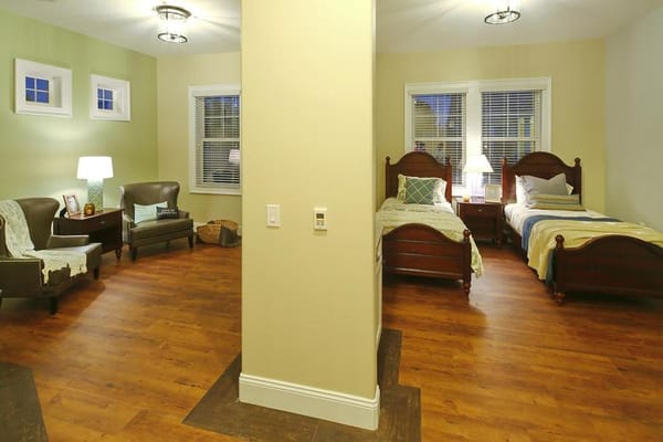Cozy twin bedroom in a senior living facility