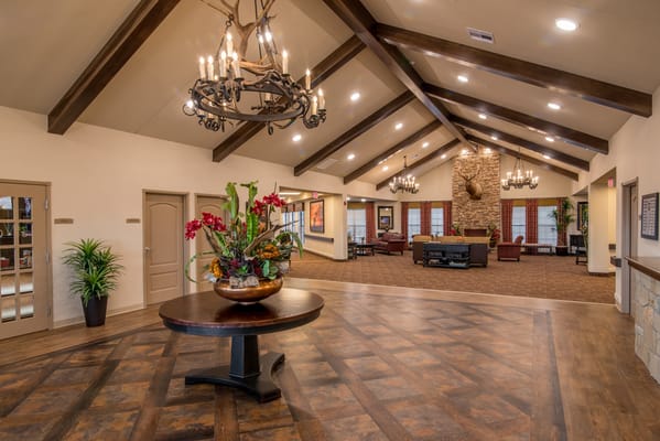 Interior common area with decorative flowers and seating