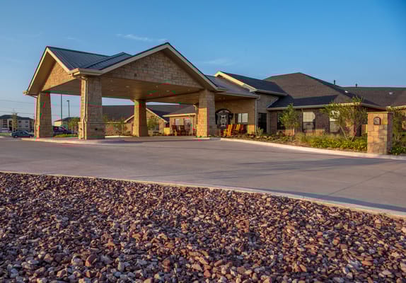 Exterior view of Ashton Medical Lodge with covered entrance