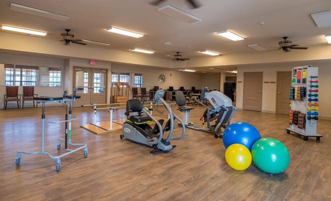 Interior view of a fitness area with exercise equipment
