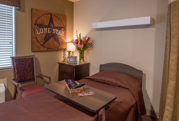 Cozy resident room with a bed and decor