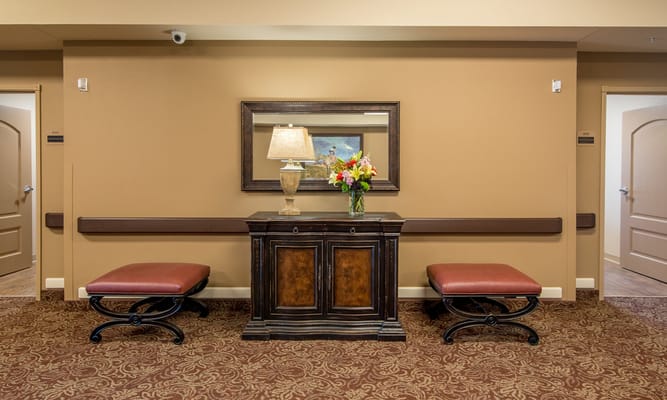 Interior of a facility lobby with seating and decorations