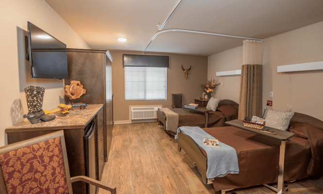 Cozy interior of a resident room with comfortable furniture