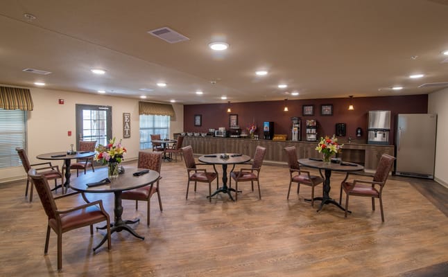 Bright dining room with tables and chairs