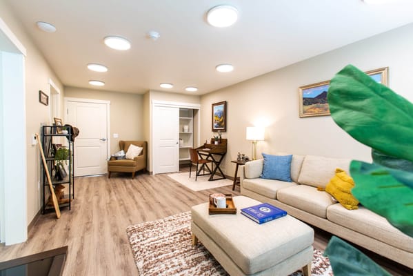 Cozy living room area in a retirement community unit