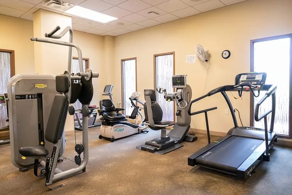 Interior view of a fitness area with exercise equipment