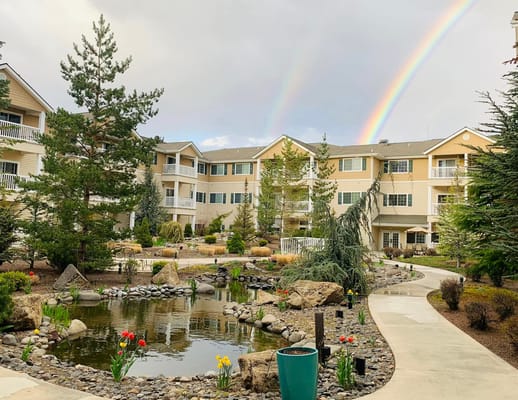 Beautiful outdoor garden with rainbow in the background
