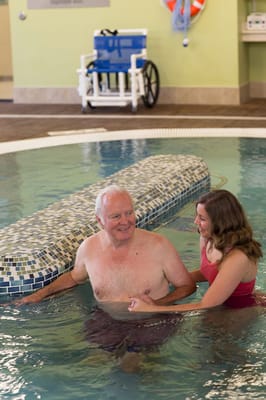 Senior resident enjoying a warm water therapy session