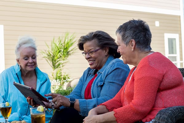 Residents enjoying a social moment outdoors