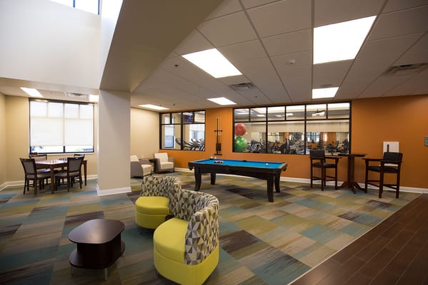 Common area with seating and pool table
