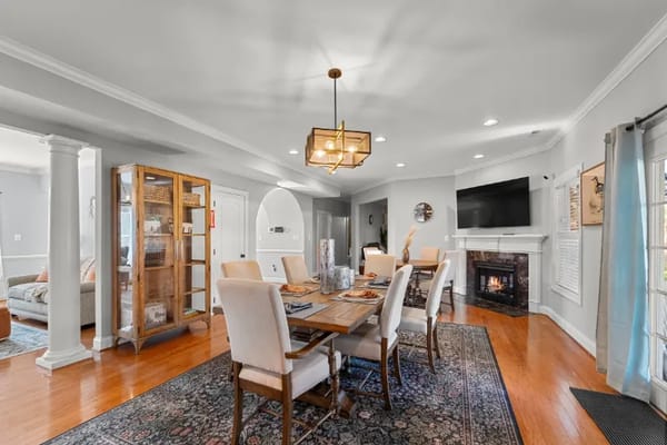 Stylish dining area with a wooden table and chairs