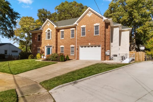 Exterior view of a senior facility with garden