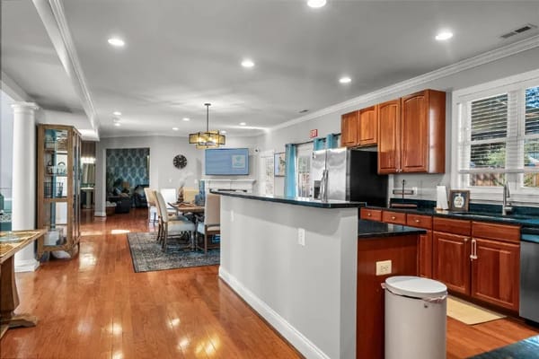 Bright interior view of a dining area and kitchen