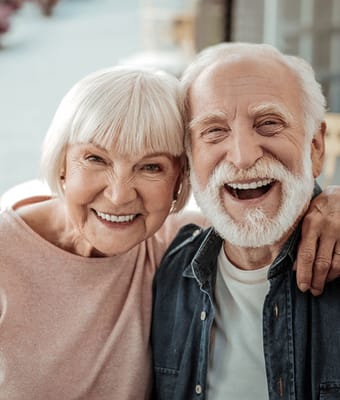 Happy elderly couple smiling together