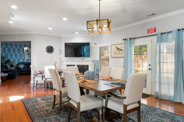 Bright dining room setting with a large table