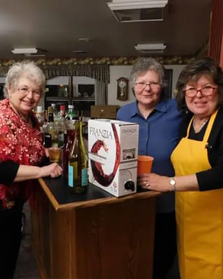 Residents enjoying a social gathering with drinks