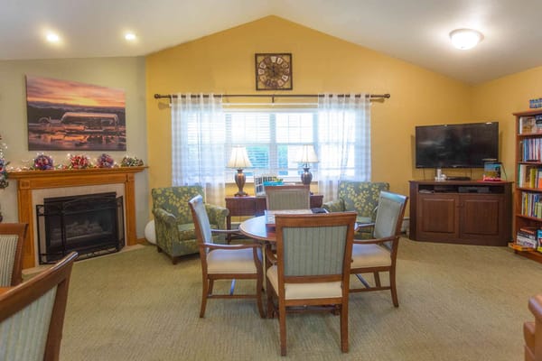 Common area with seating and a fireplace