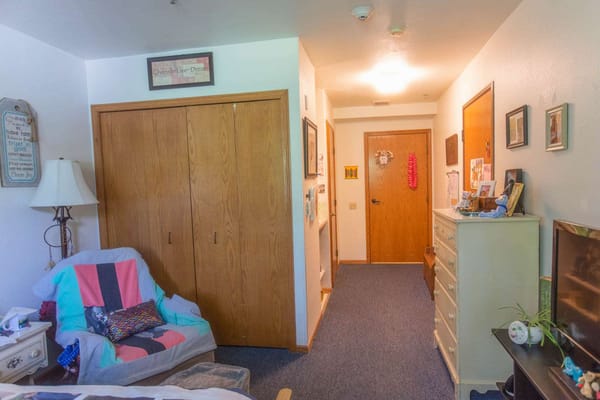 Interior view of a resident room with personal touches