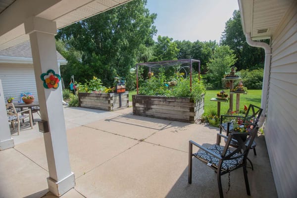 Garden area with raised flower beds and seating