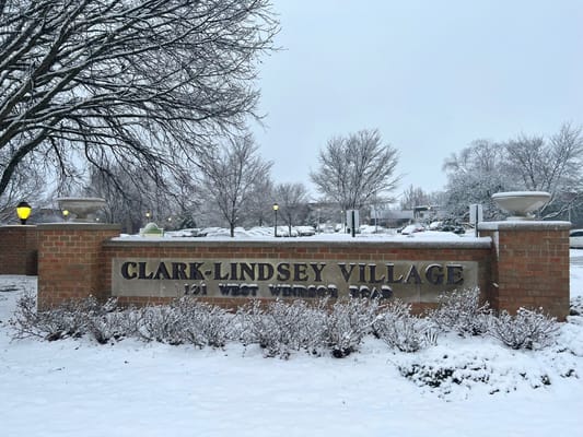 Sign for Clark-Lindsey Village in winter scenery