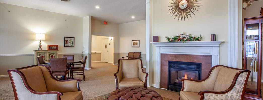 Common area with seating and a fireplace
