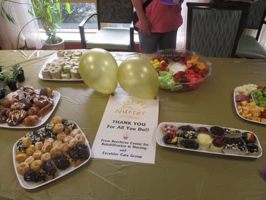 A celebration with food and decorations for nurses