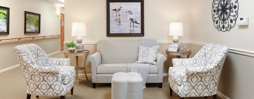 Cozy common area with comfortable seating and art