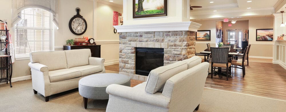 Cozy common area with seating and a fireplace